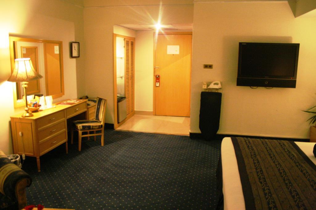 Smart Hotel Lahore Zimmer foto